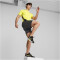 PUMA Train All Day Trainingsshirt Herren 40 - yellow burst/puma black XXL