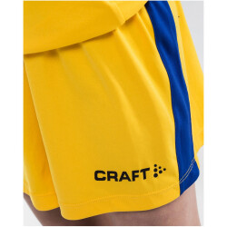 CRAFT Progress Contrast Shorts Kinder 3552 - sweden yellow/club cobolt 122/128