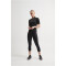 CRAFT Core Essence 7/8-Fahrradleggings Damen 999000 - black XS