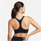 NIKE Swoosh Light Support Non-Padded Sport-BH Damen 010 - black/white XXS
