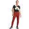 UNDER ARMOUR Unstoppable Hybrid Trainingshose Damen 840 - earthen orange/black L