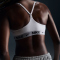 NIKE Indy Light Support Padded Adjustable Sport-BH Damen 101 - white/black S