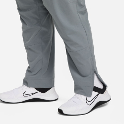 NIKE Unlimited Vielseitige Dri-FIT Trainingshose Herren 084 - smoke grey/black/smoke grey M