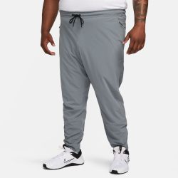 NIKE Unlimited Vielseitige Dri-FIT Trainingshose Herren 084 - smoke grey/black/smoke grey M