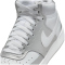 NIKE Court Vision Mid-Top Sneaker Damen 108 - white/metallic silver 36