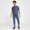 NIKE Stride Dri-FIT Woven Trainingshose Herren 437 - thunder blue/reflective silv XL