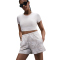 NIKE Sportswear Chill Terry Mid-Waist 4" Printed French Terry Shorts Damen 104 - lt orewood brn/sail S