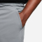 NIKE Dri-FIT Unlimited 9" Unlined Laufshorts Herren 084 - smoke grey/black/smoke grey S