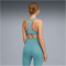PUMA 4Keeps Pebble Print Mid Support Sport-BH Damen 46 - baltic sea blue XS