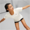 PUMA Studio Yogini Lite kurzarm Yogashirt Damen 66 - frosted ivory S